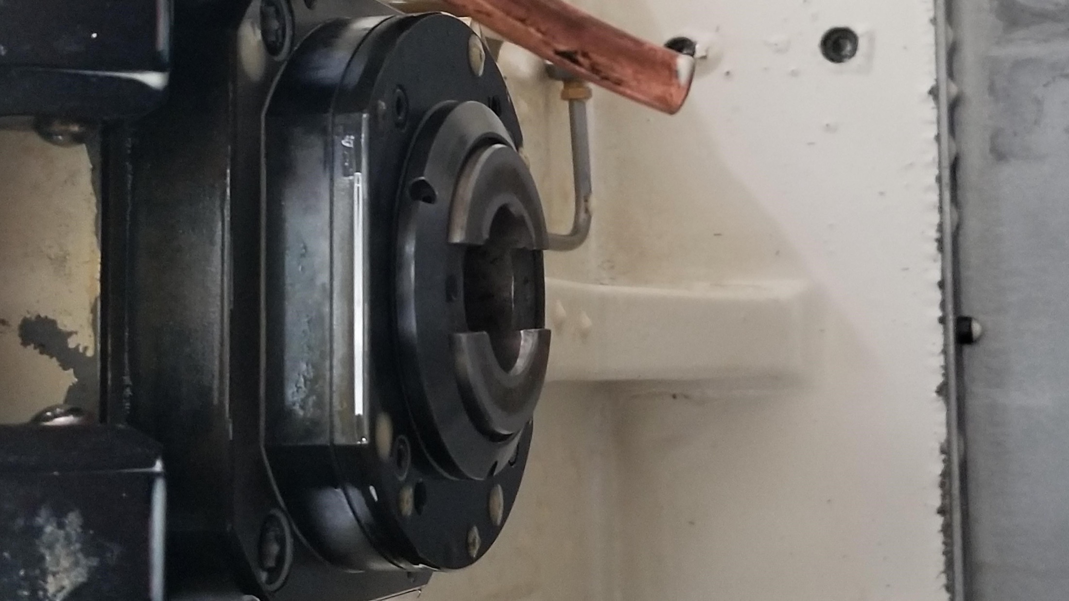 Close-up of spindle-side interface where the fixture and rotary package tie into the machine.